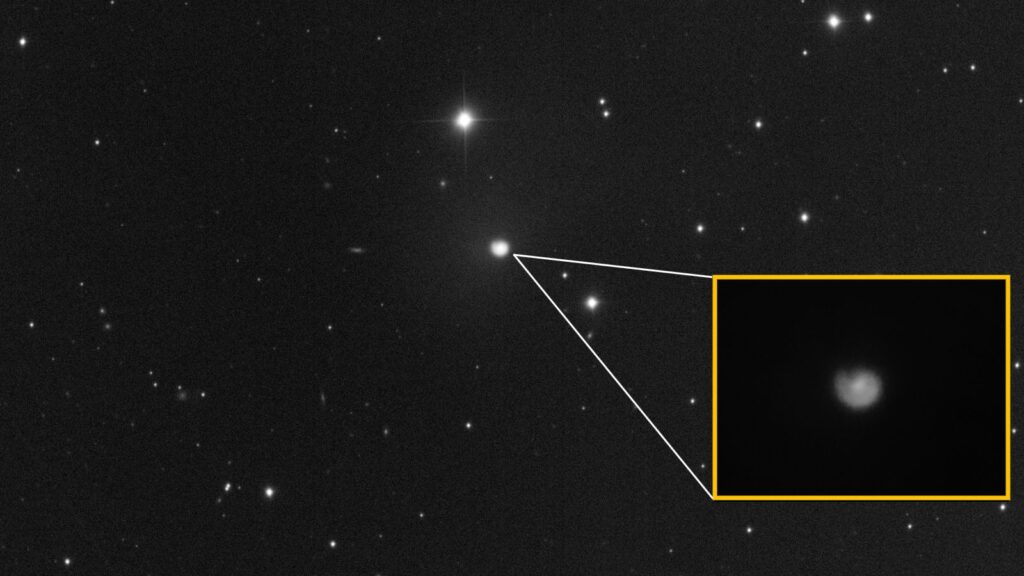 Cold, city-sized volcanic comet turns into a glowing ‘snail shell’ after massive explosion