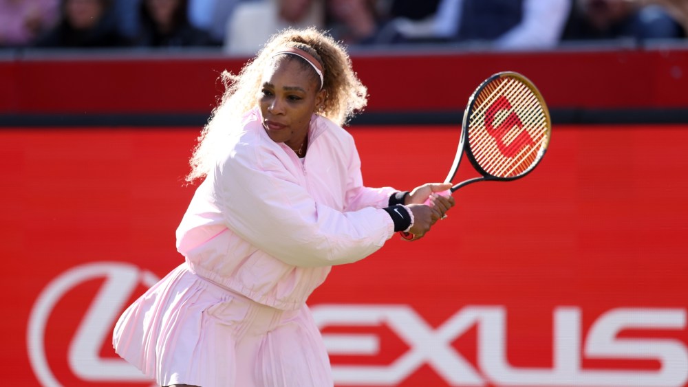 Serena Williams wears pink Nike uniform in her tennis comeback match in London