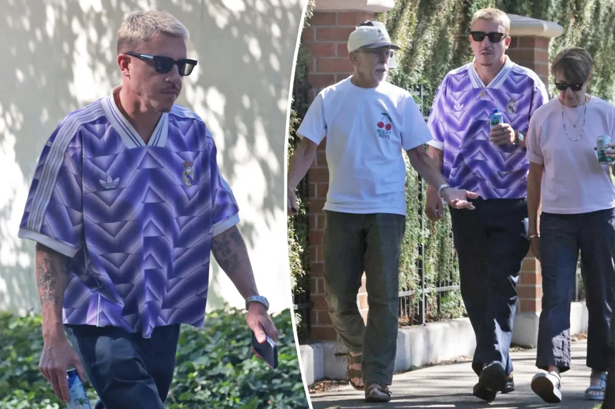 Macklemore goes on a walk with parents in Seattle amid Ed Sheeran concert debacle