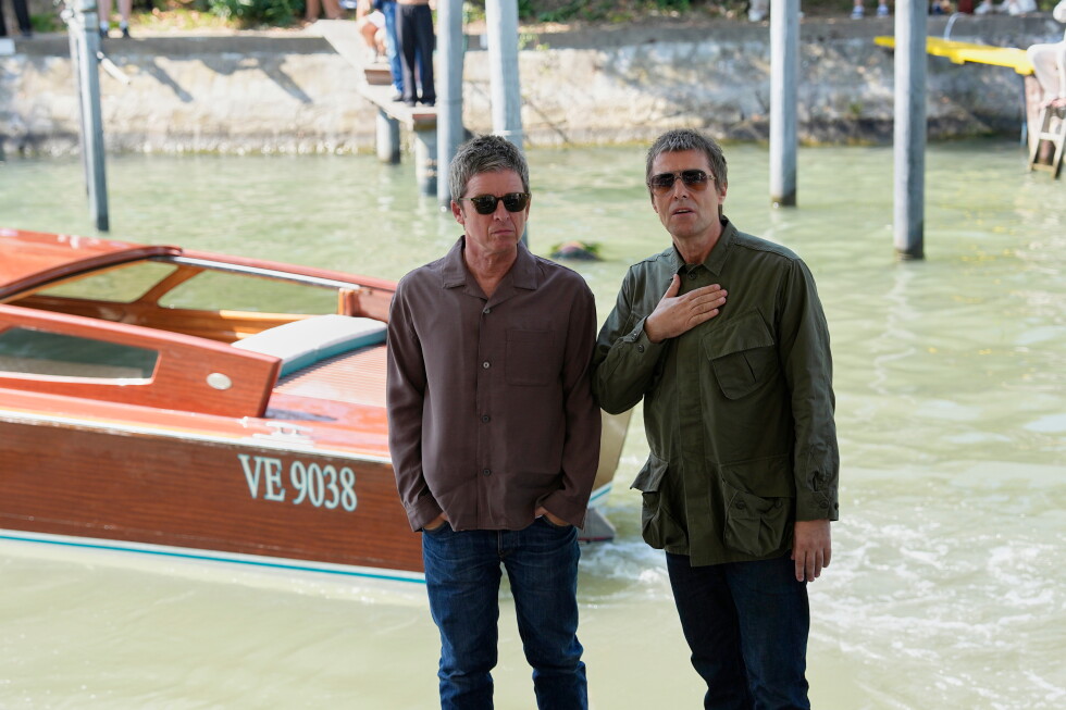 Gallagher brothers bring rock star energy to Venice Film Festival and skip the news conference
